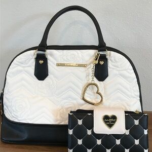 Betsy Johnson handbag with matching wallet, black and white